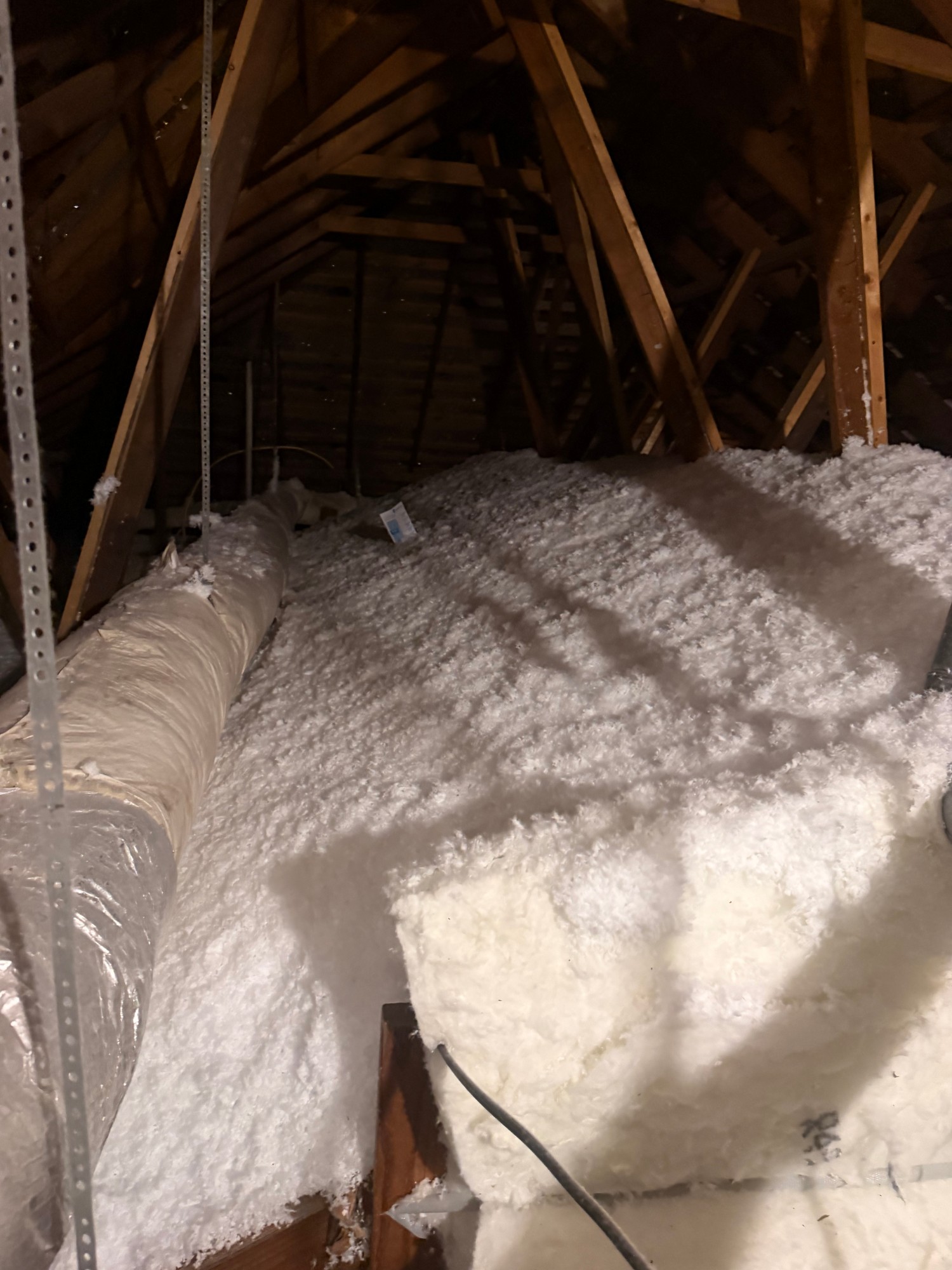 Blown-in attic insulation