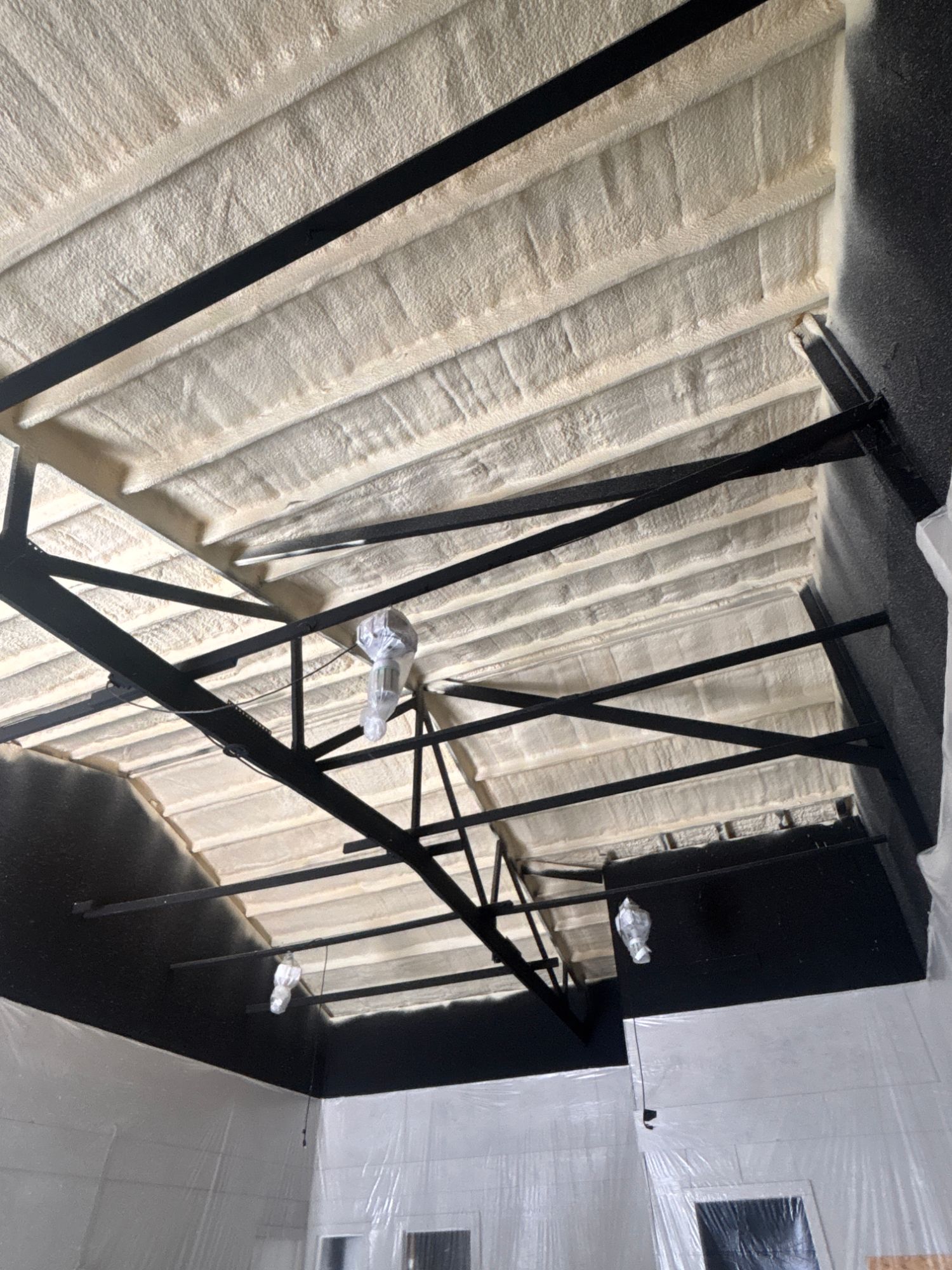 Spray foam commercial ceiling insulation